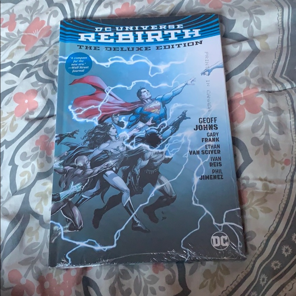 Dc universe book in wrapping never opened